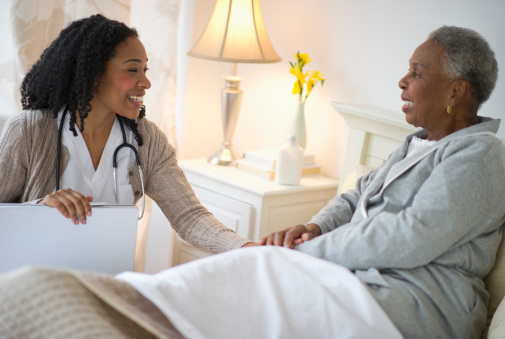 caregiver and patient in a room