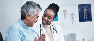 a Doctor meeting with a patient