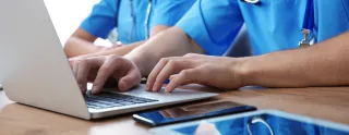 Nurse using laptop