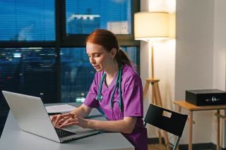 Woman working at laptop
