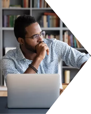 Black man looking pensively to the right