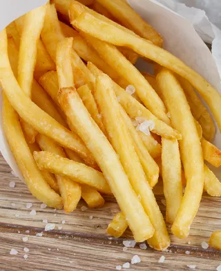 Photo of a double cheeseburger and salty fries