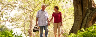 Couple walking in woods